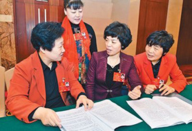 Chinese deputies focus on details for a better government work report 