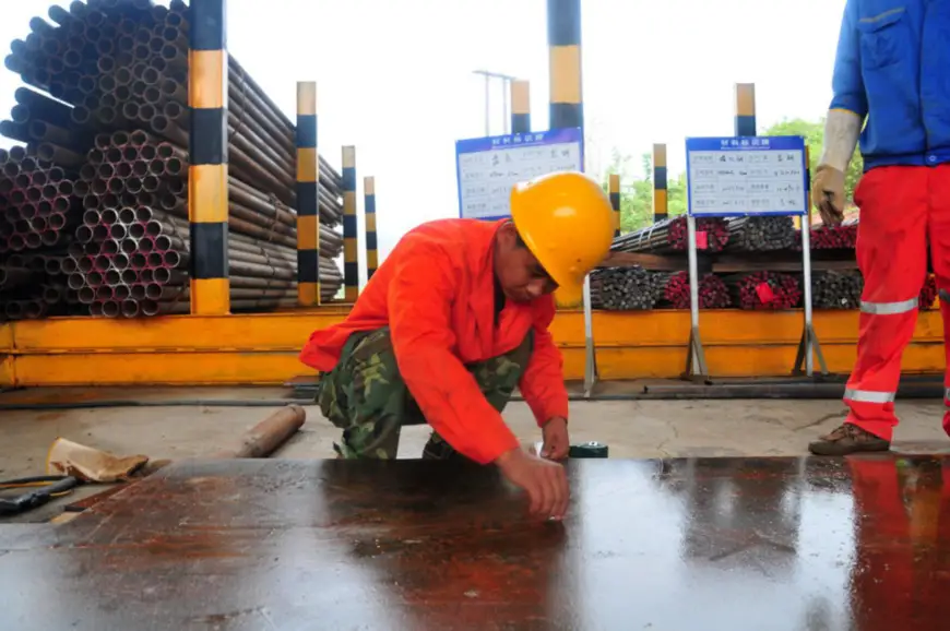 On April 13, 2017, a worker is processing steel at the construction site in the mountainous area of northern Laos' city of Muang Xay, where a tunnel of China-Laos railway project undertaken by China Railway International Group locates. China-Laos railway is the first overseas rail project mainly invested by China, co-operated by both sides and connected to Chinese railway network. The railway applied both Chinese specifications and equipment. (Photo by Xinhua News Agency)