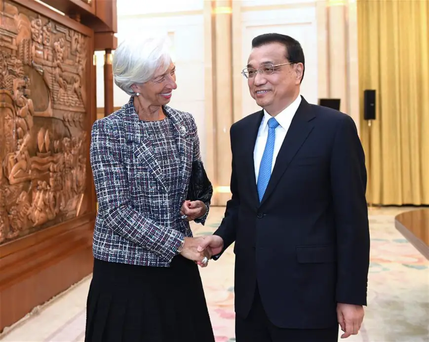 Chinese Premier Li Keqiang meets with Christine Lagarde, managing director of the International Monetary Fund (IMF), who is here for the Belt and Road Forum (BRF) for International Cooperation, at the Great Hall of the People in Beijing, capital of China, May 14, 2017. (Xinhua/Rao Aimin)