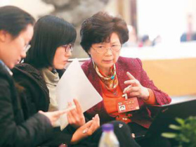 More and more women are participating in political affairs in China. (Photo by Xu Ye from People’s Daily)