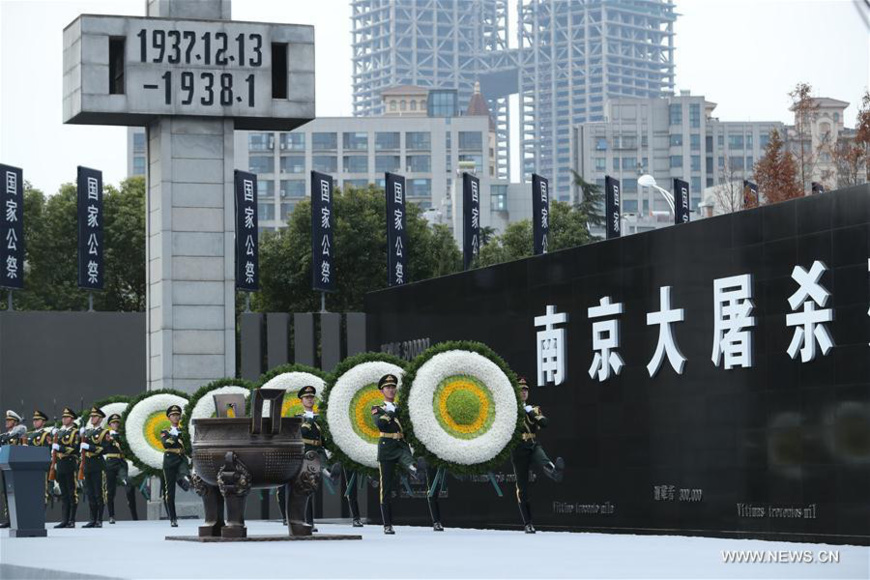 Photo taken on Dec. 13, 2017 shows the scene of state memorial ceremony for China's National Memorial Day for Nanjing Massacre Victims at the memorial hall for the massacre victims in Nanjing, east China's Jiangsu Province, Dec. 13, 2017. (Xinhua/Pang Xinglei) Photo taken on Dec. 13, 2017 shows the scene of state memorial ceremony for China's National Memorial Day for Nanjing Massacre Victims at the memorial hall for the massacre victims in Nanjing, east China's Jiangsu Province, Dec. 13, 2017. (Xinhua/Pang Xinglei)