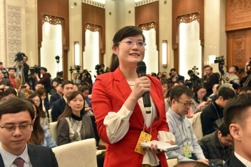 A People’s Daily journalist raises a question to spokesperson Wang Guoqing at the press conference of the first session of the 13th National Committee of the Chinese People's Political Consultative Conference (CPPCC), March 2, 2018. (Photo by Lei Sheng from People’s Daily) A People’s Daily journalist raises a question to spokesperson Wang Guoqing at the press conference of the first session of the 13th National Committee of the Chinese People's Political Consultative Conference (CPPCC), March 2, 2018. (Photo by Lei Sheng from People’s Daily)