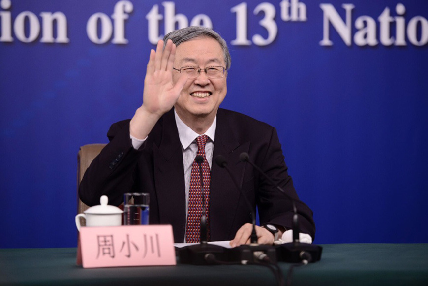 Zhou Xiaochuan, governor of the People's Bank of China, fields questions at a press conference on the sidelines of the first session of the 13th National People's Congress in Beijing, capital of China. (Photo by Zhang Qichuan from People’s Daily Online) Zhou Xiaochuan, governor of the People's Bank of China, fields questions at a press conference on the sidelines of the first session of the 13th National People's Congress in Beijing, capital of China. (Photo by Zhang Qichuan from People’s Daily Online)