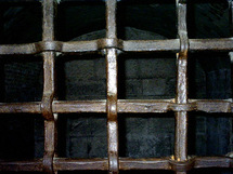 Les barreaux d'une cellule de prison. Les barreaux d'une cellule de prison.
