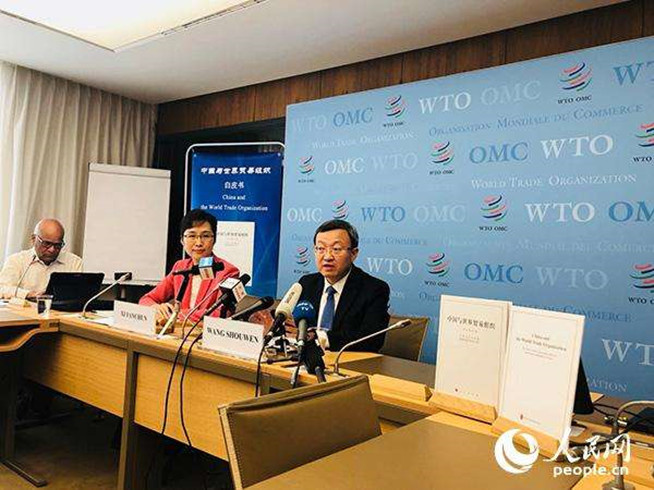 A press briefing is held to introduce the white paper titled "China and the World Trade Organization" on July 12, 2018 at the WTO headquarters. (Photo from People’s Daily Online)