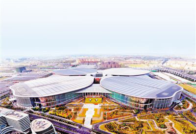 An aerial picture of the National Exhibition and Convention Center (NECC), the venue of the first China International Import Expo (CIIE).Photo by Fan Jun from Xinhua News Agency An aerial picture of the National Exhibition and Convention Center (NECC), the venue of the first China International Import Expo (CIIE).Photo by Fan Jun from Xinhua News Agency