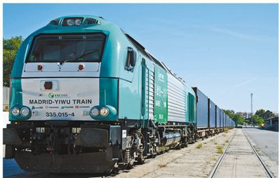 A cargo train departs from a train station in Spain and travels along the Yiwu-Xinjiang-Europe cargo line. Photo by Xie Haining from Xinhua News Agency