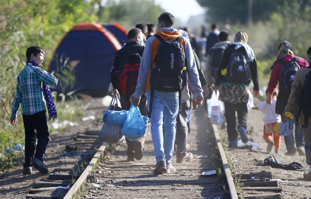 Des migrants en Hongrie le 9 septembre 2015.AP Photo/Matthias Schrader. — Matthias Schrader/AP/SIPA Des migrants en Hongrie le 9 septembre 2015.AP Photo/Matthias Schrader. — Matthias Schrader/AP/SIPA