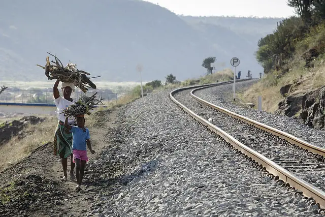 Walking along the main railway line near Ressano Garcia. Photo: John Hogg / World Bank