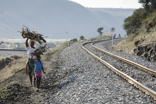 Walking along the main railway line near Ressano Garcia. Photo: John Hogg / World Bank