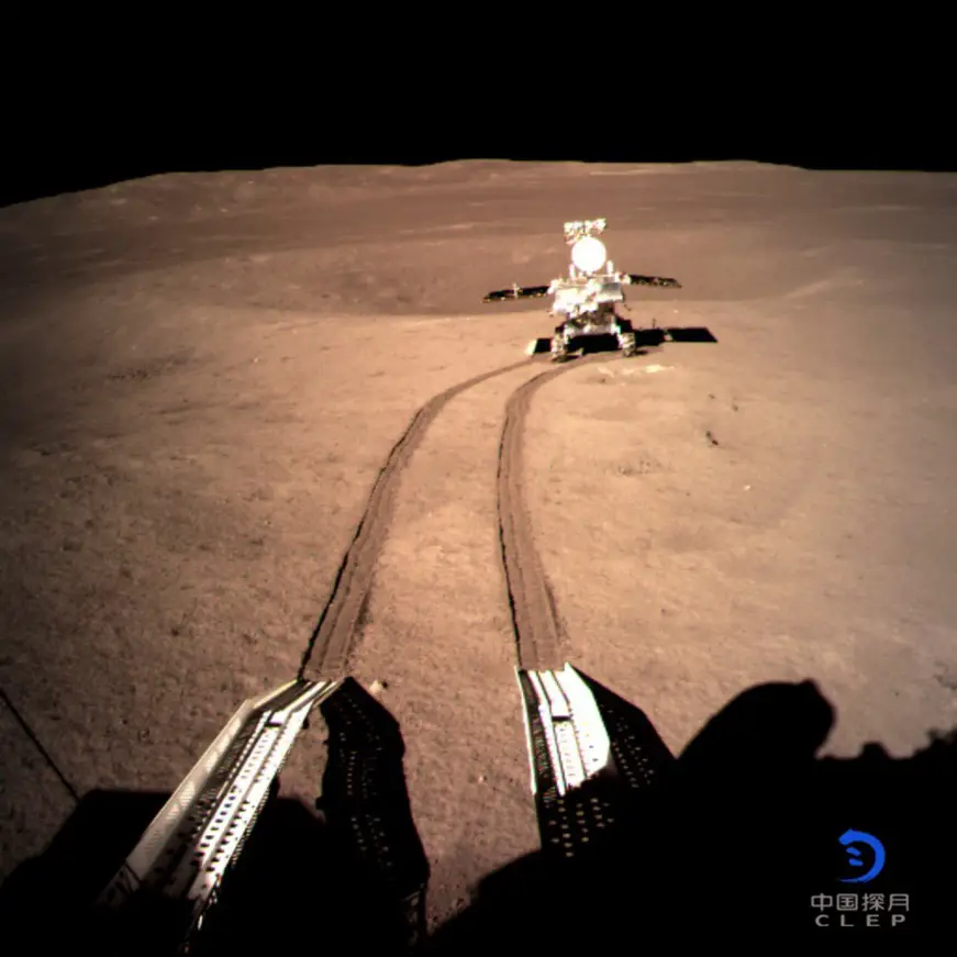 China National Space Administration on Jan. 4, 2019 released a photo taken by a camera installed on the lander of the Chang’e-4 probe, revealing the rover Yutu-2 and its traces at the planned landing site. (published by Xinhua, photo by China National Space Administration)