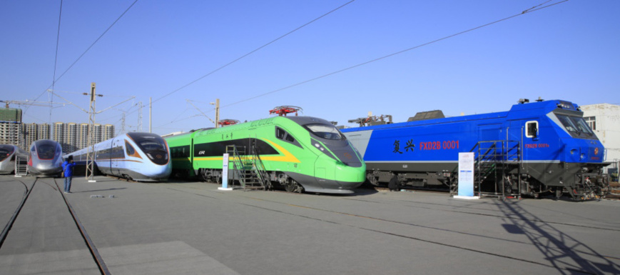 Fuxing bullet trains are exhibited at the China Railway Science and Technology Innovation Achievement Exhibition, December 25, 2018. The exhibition was opened at the China National Railway Track Test Centre, Beijing on December 24, 2018. The exhibition, hosted by China Railway Corporation, displayed a batch of advanced railway technologies and equipment independently developed by China, including the 17-carriage Fuxing bullet train running at 350-KPH, 8-carriage Fuxing bullet train running at 250-KPH, and a Fuxing model with a centralized power system that runs at 160 KPH. In addition, the new coatings for the high speed trains running on the Beijing-Zhangjiakou Railway were also unveiled for the first time at the exhibition. (Photo by People’s Daily Online)