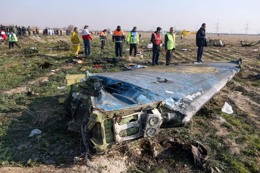 Sur la scène du crash, près de l'aéroport Imam-Khoneini, mercredi. © AFP