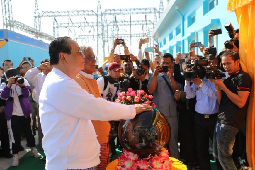 Myanmar's Union Minister for Electricity and Energy U Win Khaing inaugurates the 230KV Nabar-Shwebo-Ohntaw Power Transmission Line and Substation Project undertaken by the State Grid Corporation of China at the completion ceremony of the project. Photo by Sun Guangyong, People's Daily Myanmar's Union Minister for Electricity and Energy U Win Khaing inaugurates the 230KV Nabar-Shwebo-Ohntaw Power Transmission Line and Substation Project undertaken by the State Grid Corporation of China at the completion ceremony of the project. Photo by Sun Guangyong, People's Daily