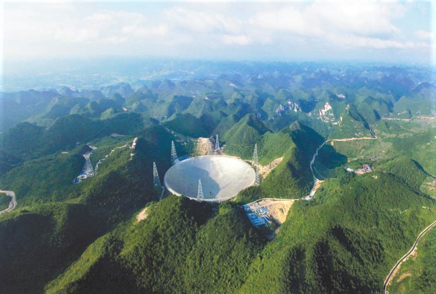 Photo shows FAST located in the magnificent karst mountains of southwest China’s Guizhou Province. (Photo by Qin Gang/CPANET.CN)