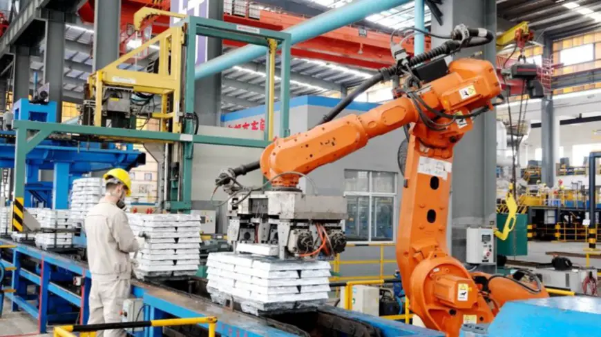 A robotic arm stacks zinc ingot products at a workshop of Nandan Nanfang Non-ferrous Metals Smelting Co. in Nandan county, south China’s Guangxi Zhuang Autonomous Region, March 1, 2020. Gao Dongfeng/People’s Daily Online