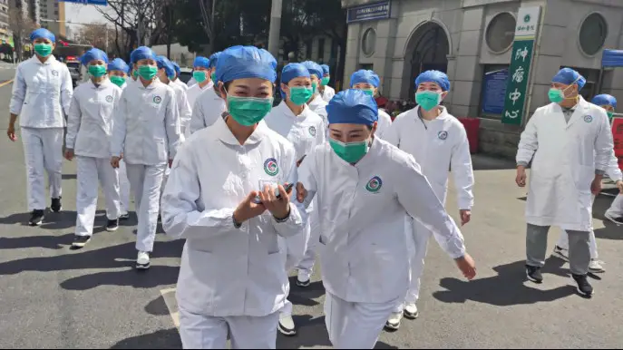 Medics from the cancer center of Wuhan Union Hospital feel relieved as the hospital finally sees no severely ill COVID-19 patients on March 14, 2020. Photo by Li Changlin/People’s Daily Online