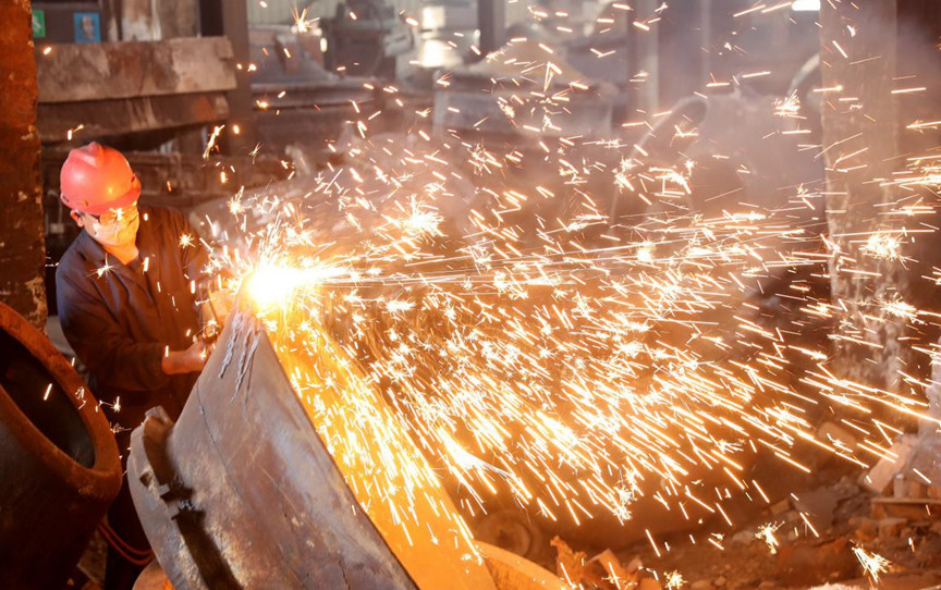 Workers of a factory in east China’s Zhejiang province manufacture cast metal products to be exported to Belt and Road countries, March 18, 2020. Xie Shangguo/People’s Daily Online