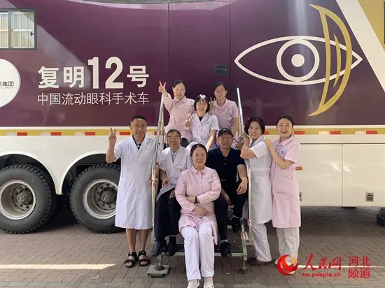 Members of the mobile medical team pose for a picture in front of their operation van. Photo courtesy of the first outpatient department directly under the provincial government of Hebei Province