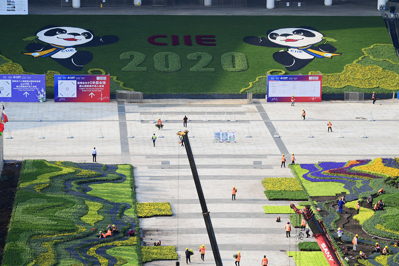 Gardeners prepare flower decorations for the upcoming 3rd China International Import Expo (CIIE) at a square of the National Exhibition and Convention Center in Shanghai, Oct. 17, 2020. Photo by Ji Haixin/People's Daily Online