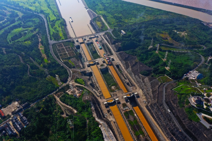 Vessels pass the ship lock of the Three Gorges Dam in August, 2020. Photo by Huang Shanjun, People's Daily Online