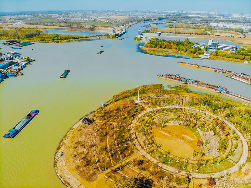 An aerial photo taken on November 3 shows a green and modern shipping demonstration zone at a section of the Beijing-Hangzhou Grand Canal in Huai'an, east China's Jiangsu province. (Photo by Wang Hao/People's Daily Online)