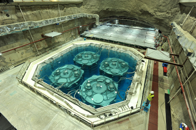 Four neutrino detectors are installed in a huge pool. Photo by the Institute of High Energy Physics, Chinese Academy of Sciences Four neutrino detectors are installed in a huge pool. Photo by the Institute of High Energy Physics, Chinese Academy of Sciences