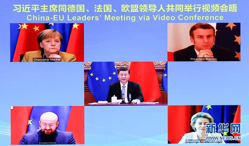 Chinese President Xi Jinping meets with German Chancellor Angela Merkel, French President Emmanuel Macron, President of the European Council Charles Michel and President of the European Commission Ursula von der Leyen via video link in Beijing, Dec. 30, 2020. They announced that China and the EU have completed investment agreement negotiations as scheduled. (Photo by Li Xueren/Xinhua News Agency)