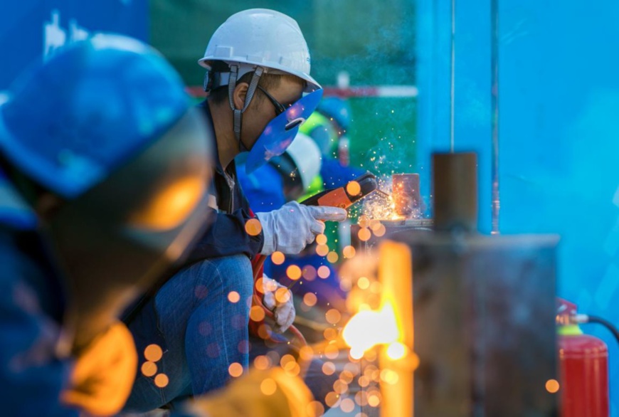 Workers join a construction skill competition held in Hohhot, Inner Mongolia autonomous region, Sept. 10, 2020. (Photo by Ding Genhou/People’s Daily Online)