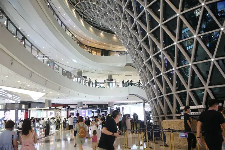 Tourists shop at a duty-free shopping mall in Sanya City, south China's Hainan Province, July 29, 2020. Photo by Zhang Jingang/People’s Daily Online