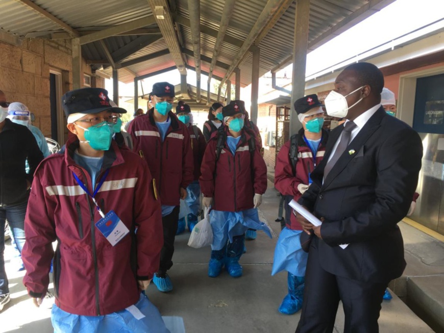 Photo taken on Sept. 30, 2020, shows members of a medical expert team sent by Chinese government to Lesotho sharing experience in fighting the COVID-19 pandemic with local medical workers in a designated hospital for the treatment of COVID-19 patients in Lesotho. (Photo/Courtesy of the Chinese medical expert team sent to Lesotho)