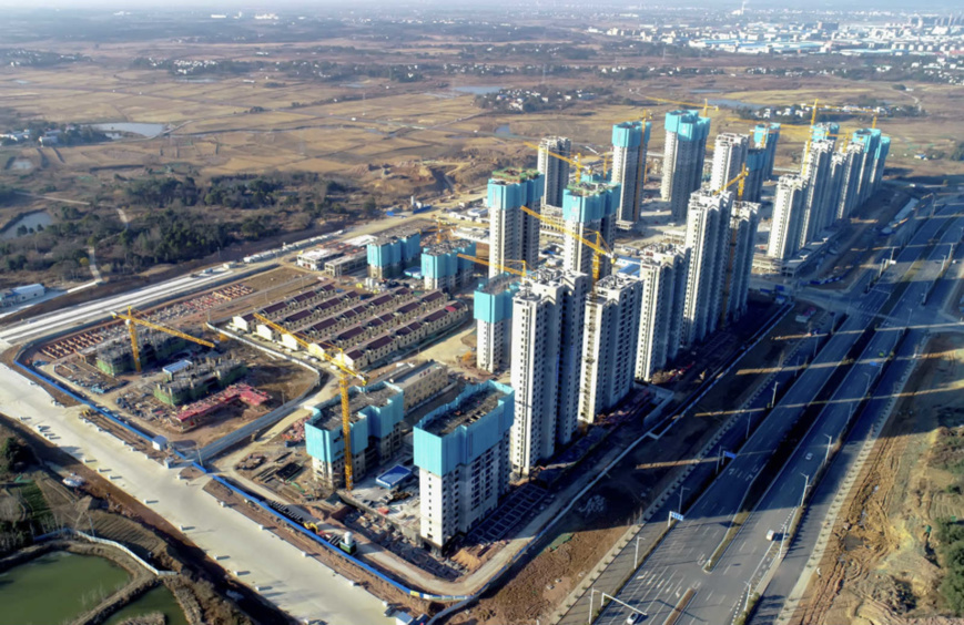 Photo taken on Jan. 8 shows the site of a shantytown renovation project in Tongcheng, east China's Anhui Province. (Photo by Jiang Sheng/People's Daily Online)