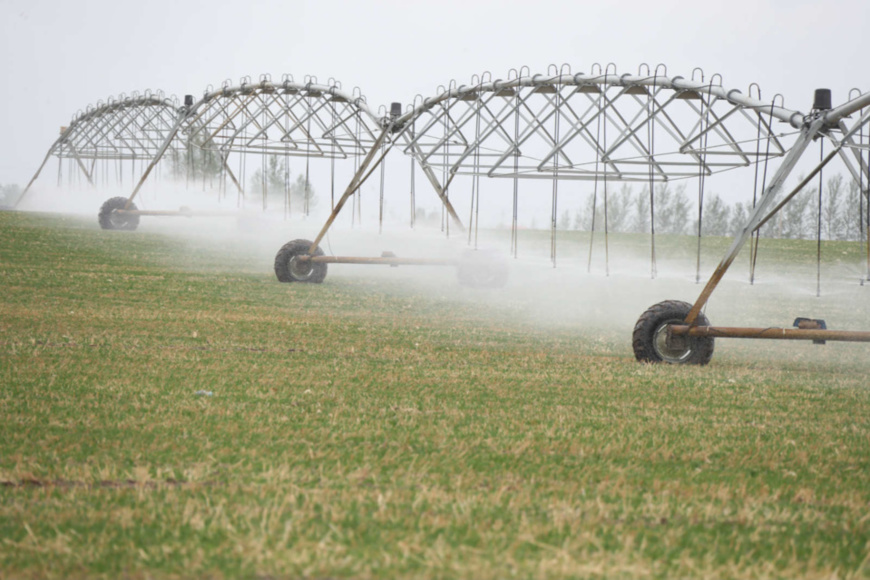 Machines are watering a man-made grassland in Ar Horqin Banner, Chifeng, north China's Inner Mongolia Autonomous Region, May 3, 2020. (Photo by Li Fu/People's Daily Online)