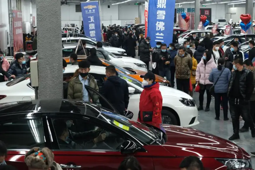 Visitors shop for cars at an automobile exhibition held in Northeast China’s Liaoning Province, Shenyang on Feb. 27. Photo by Huang Jinkun/People’s Daily Online