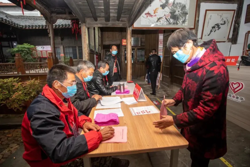 A villager votes for village cadres in Qianxibian village, Tangya Township, Jindong District, Jinhua, east China's Zhejiang Province, Nov. 26, 2020. (Photo by Yang Meiqing/People's Daily Online)