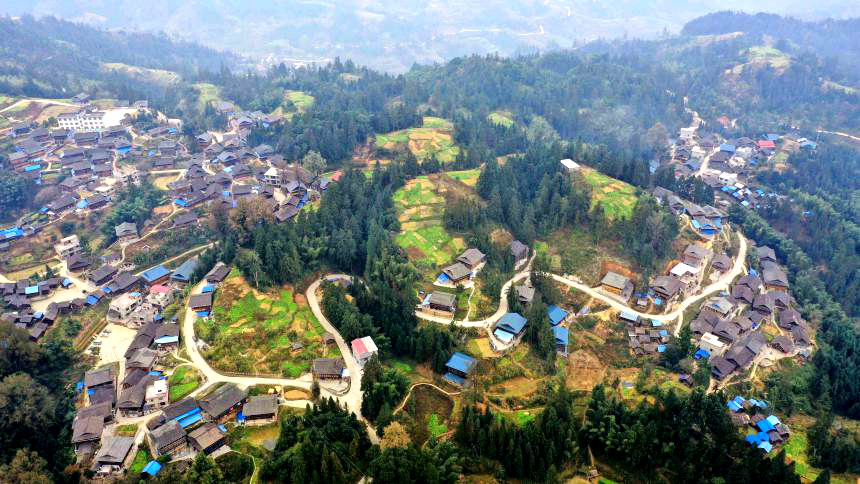 Photo taken on Dec. 26, 2020 shows a hardened road built in Gaowu village, Qiandongnan Miao and Dong Autonomous Prefecture, southwest China's Guizhou Province. (Photo by Li Changhua/People's Daily Online)