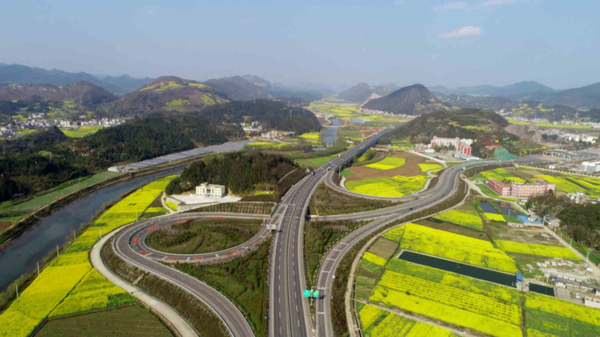 Photo taken on Feb. 24, 2021, shows a transportation network in Luoping county, Qujing city, southwest China's Yunnan province. (Photo by Mao Hong/People's Daily Online)