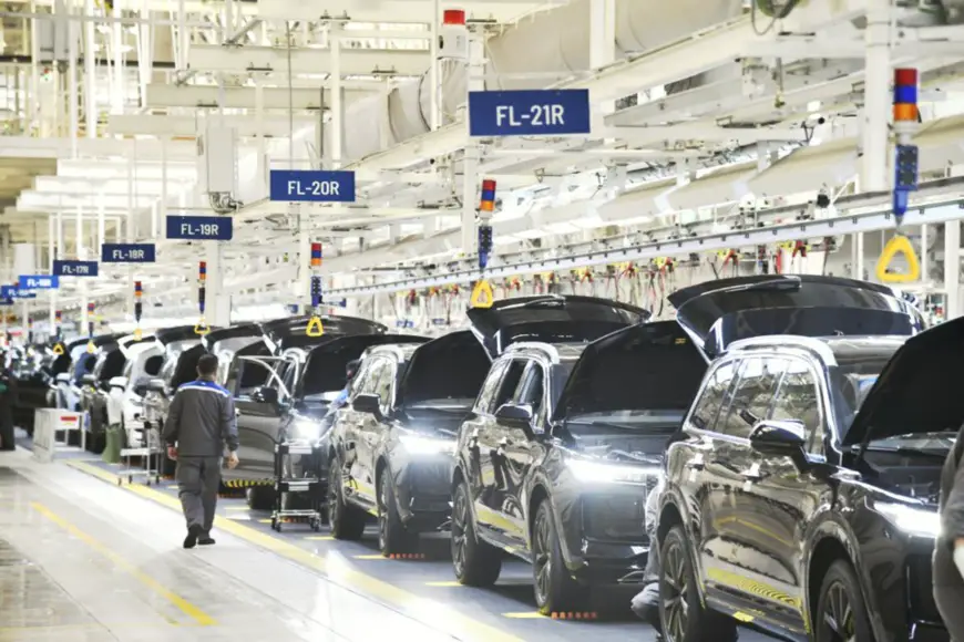 Photo taken on April 25, 2021, shows Beijing-based electric car maker Li Xiang’s production line of new energy vehicles in a manufacturing base in Changzhou, east China’s Jiangsu province. (Photo by Xia Chenxi/People’s Daily Online)