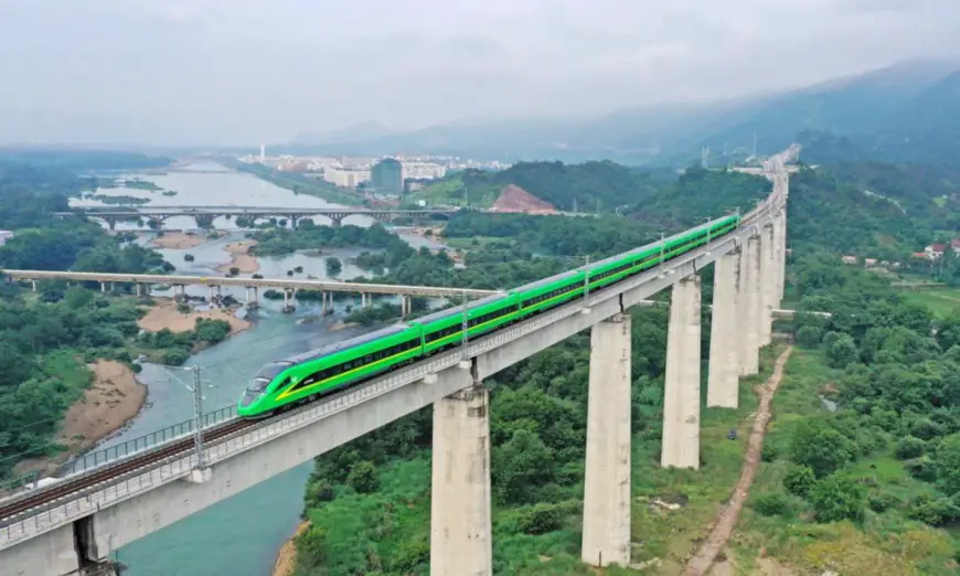 A bullet train runs on a bridge of Jinhua-Taizhou railway in east China's Zhejiang province, June 18, 2021. The train can run as much as 160 kilometers per hour. (Photo by Wang Huabin/People's Daily Online)