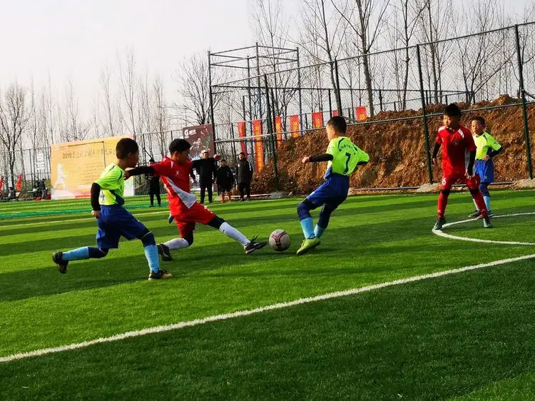 A football team of Zhonglianchuan Primary School in northwest China’s Gansu province takes part in a contest in central China’s Henan province, Jan. 2019. (Photo/Zhonglianchuan Primary School)