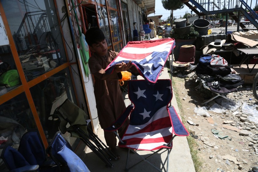 Residents recycle materials left by the U.S. troops near Bagram Air Base in Parwan province, Afghanistan, July. 3, 2021. (Xinhua/Rahmatullah Alizadah)