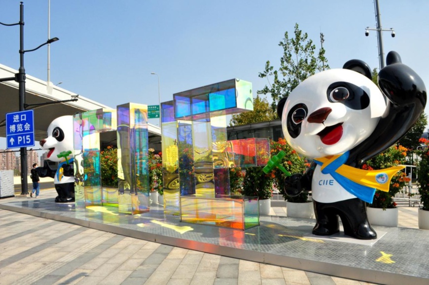 Photo taken on Oct. 30, 2021, shows statues of Jinbao, the mascot of the China International Import Expo (CIIE), standing near the National Exhibition and Convention Center (Shanghai), venue for the event. (Photo by Yan Daming/People’s Daily Online)