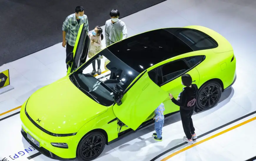 The 2022 Haikou International New Energy Vehicle & Connected Mobility Show is held at Hainan International Convention and Exhibition Center in Haikou in south China's Hainan province, Jan. 8, 2022. (Photo by Su Bikun/People’s Daily Online)