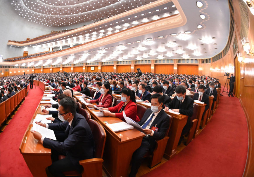The fifth session of the 13th National People’s Congress opens at the Great Hall of the People in Beijing, March 5, 2022. (Photo by Lei Sheng/People’s Daily) The fifth session of the 13th National People’s Congress opens at the Great Hall of the People in Beijing, March 5, 2022. (Photo by Lei Sheng/People’s Daily)