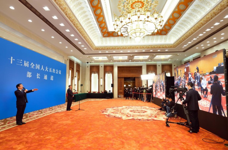 He Lifeng, head of the National Development and Reform Commission, attends an interview via video link after the opening meeting of the fifth session of the 13th National People's Congress (NPC) in Beijing, capital of China, March 5, 2022. (By Lei Sheng/People's Daily)