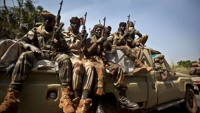 Un convoi de soldats tchadiens à Damara, en RCA, le 2 janvier 2013. Crédit photo : Ben Curtis - AP - SIPA