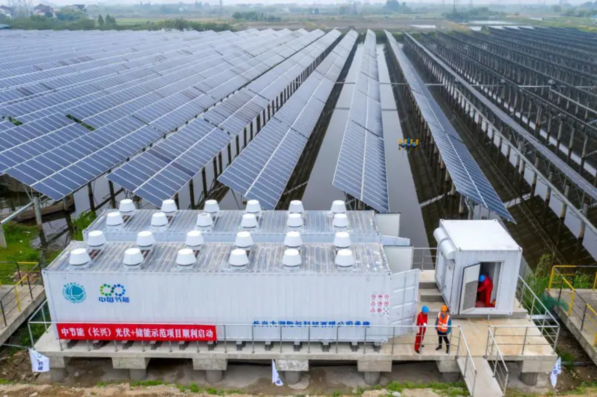 Photo taken on April 23, 2021 shows an aerial view of a project combining new energy power generation and energy storage at an industrial park in Lvshan township, Changxing county, Huzhou city, east China’s Zhejiang province. The industrial park operated by China Energy Conservation and Environmental Protection Group features the integration of photovoltaic power generation and fish farming. (Photo by Tan Yunfeng/People’s Daily Online)