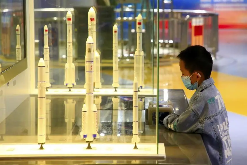 A child visits an aerospace exhibition at the Ningxia Science and Technology Museum, northwest China's Ningxia Hui autonomous region, April 17, 2022. (Photo by Yuan Hongyan/People’s Daily Online)