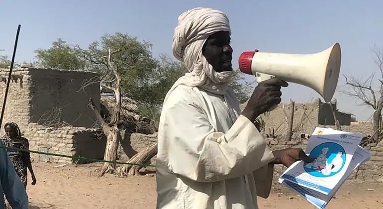 ©WFP/TabamMbatelham. Au Tchad, 80 troubadours se rendent dans huit provinces pour sensibiliser les populations des régions isolées afin de promouvoir des habitudes saines et de dissiper tout doute sur le Covid-19.