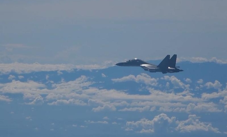 A video screenshot shows a warplane conducting operations during exercises and training of the air force corps of the Eastern Theater Command of the Chinese People's Liberation Army (PLA) around the Taiwan Island, Aug. 5, 2022. The Eastern Theater Command on Friday continued joint combat exercises and training in the waters and airspace around the Taiwan Island.